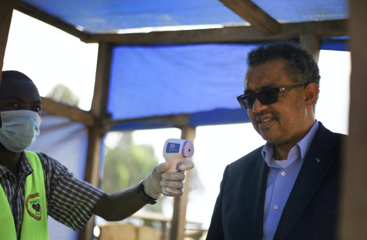 <span class="caption">Director-General of the World Health Organization (WHO), Tedros Adhanom Ghebreyesus, right, has his temperature taken as he arrives at Ruhenda airport in Butembo in eastern Congo, June 15, 2019. </span> <span class="attribution"><a class="link " href="http://www.apimages.com/metadata/Index/Congo-Ebola-Outbreak/beac2d7e504d4ac1a859040208d903a9/1/0" rel="nofollow noopener" target="_blank" data-ylk="slk:AP Photo/Al-hadji Kudra Maliro;elm:context_link;itc:0;sec:content-canvas">AP Photo/Al-hadji Kudra Maliro</a></span>