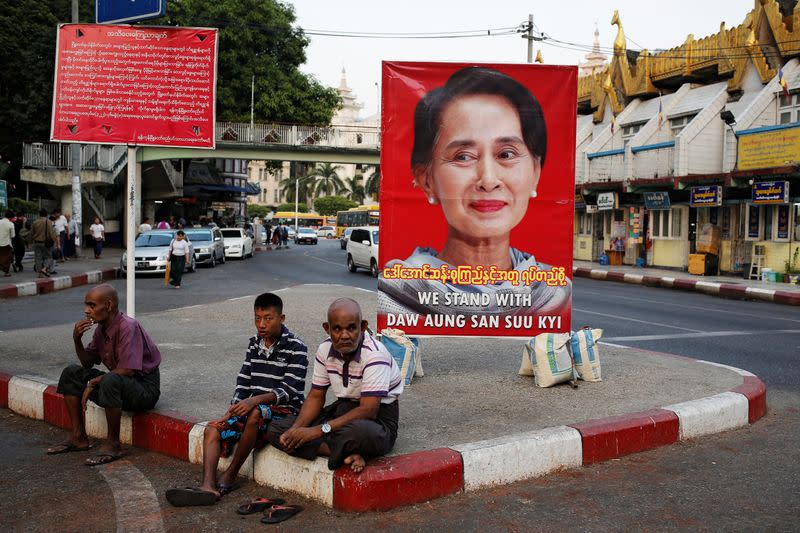 A poster supporting Aung San Suu Kyi as she attends a hearing at the International Court of Justice is seen in a road in Yangon