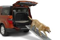 <p><strong>Dogs </strong>and <strong>SUVs </strong>go together like <strong>salt </strong>and <strong>vinegar </strong>so we’re not surprised that <strong>Honda </strong>catered directly to the market. It showed off its Dog Friendly for the boxy <strong>Element </strong>at the 2009 New York Auto Show and, to many canine lovers’ delight, added it to the options list in 2010. The pack consisted of a detachable ramp to help pooches into the boot area, which was lined with a padded, water-resistant crate.</p><p>It also came with an electric cooling fan in the boot to blow fresh air on to your hound. You also got a special bag to hold the collar, lead and poop bags. In the main cabin, unique dog bone pattern mats and seat covers were supplied and there were even exterior dog’s paw badges included in the <strong>£750 </strong>price.</p>