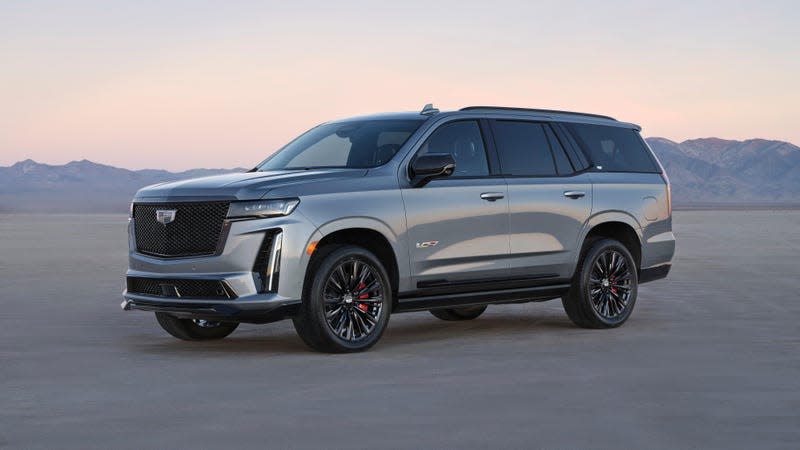 Front 7/8 view of the 2024 Cadillac Escalade V-Series in Argent Silver Metallic