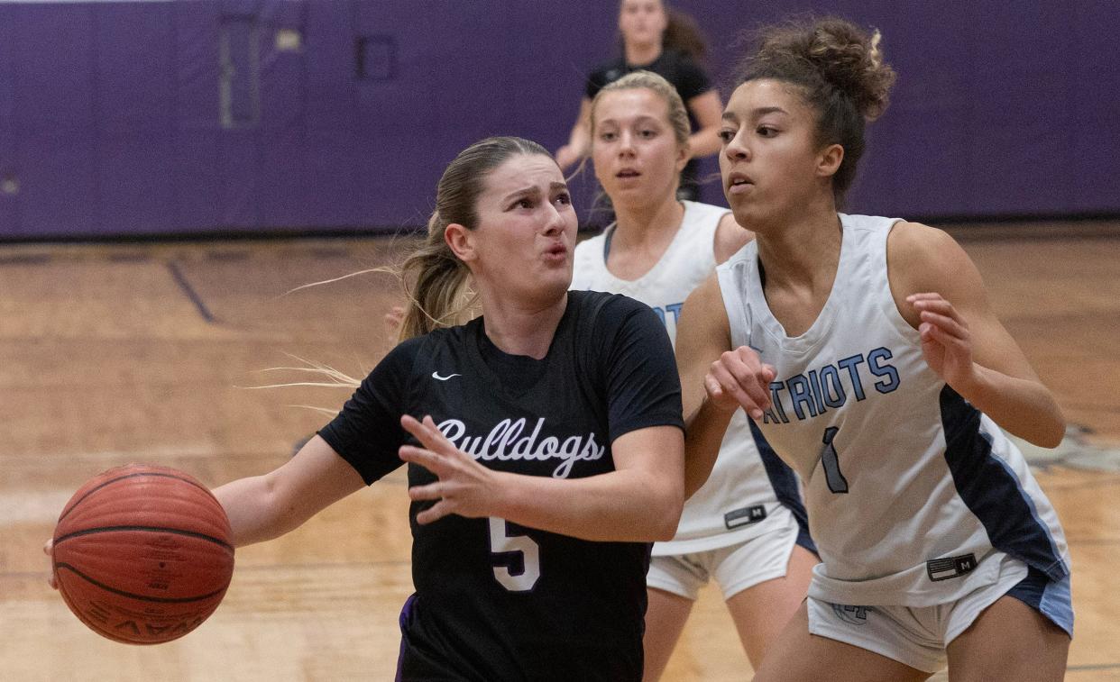 Rumson Raquel Guidetti drives to the basket against Freehold Gaby Parker. Rumson-Fair Haven Girls basketball defeats Freehold Township in Rumson NJ on February 6, 2024.