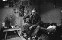 <p>2nd Lieutenant Franc Barringer sitting on his bed in camp in Vietnam. (Photo: Terry Fincher/Daily Express/Hulton Archive/Getty Images) </p>