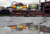 ST LOUIS, MO - OCTOBER 19: A rain tarp covers the infield at Busch Stadium prior to Game One of the MLB World Series between the Texas Rangers and St Louis Cardinals on October 19, 2011 in St Louis, Missouri. (Photo by Doug Pensinger/Getty Images)