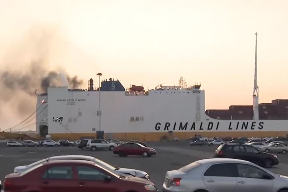 <p>CBS New York/Youtube</p> The "Grande Coaster Eadoirio" cargo ship on fire at the Elizabeth Marine Terminal in Port Newark, New Jersey 