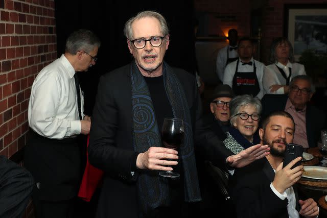 <p>Marion Curtis/StarPix for Max/Shutterstock </p> Steve Buscemi makes a toast at the 25th Anniversary Celebration for HBO's "The Sopranos" held at Da Nico Ristorante in New York City