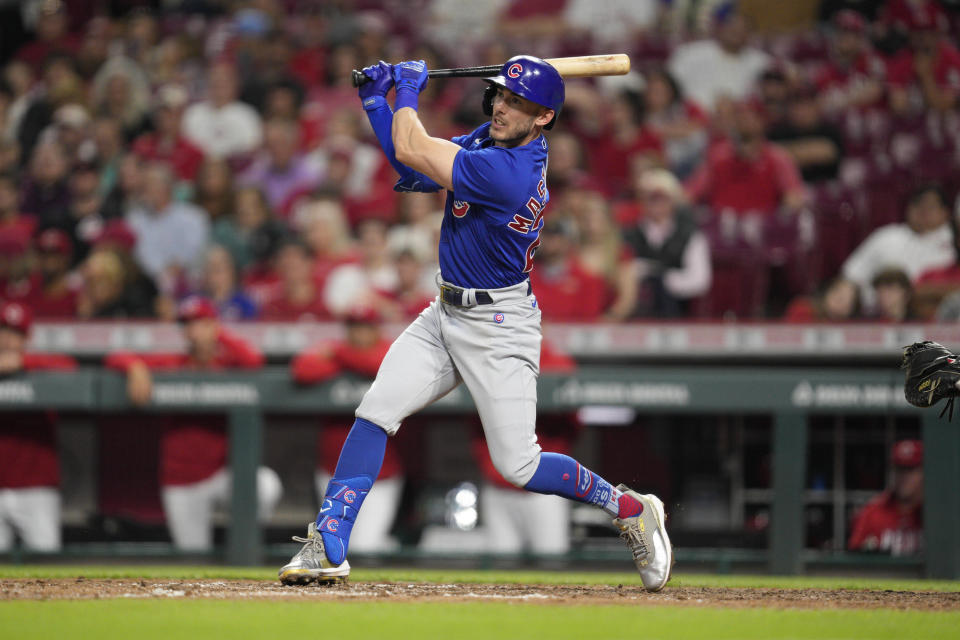 Chicago Cubs' Miles Mastrobuoni watches his RBI single against the Cincinnati Reds in the seventh inning of a baseball game in Cincinnati, Tuesday, April 4, 2023. (AP Photo/Jeff Dean)