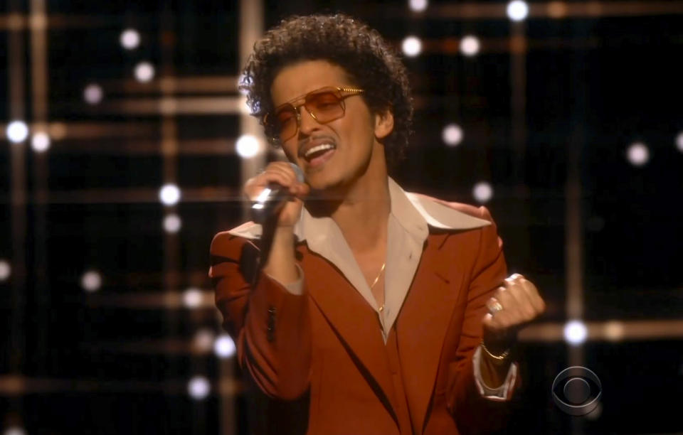 In this video grab provided by CBS and the Recording Academy, Bruno Mars performs "Leave The Door Open"at the 63rd annual Grammy Awards at the Los Angeles Convention Center on Sunday, March 14, 2021. (CBS/Recording Academy via AP)