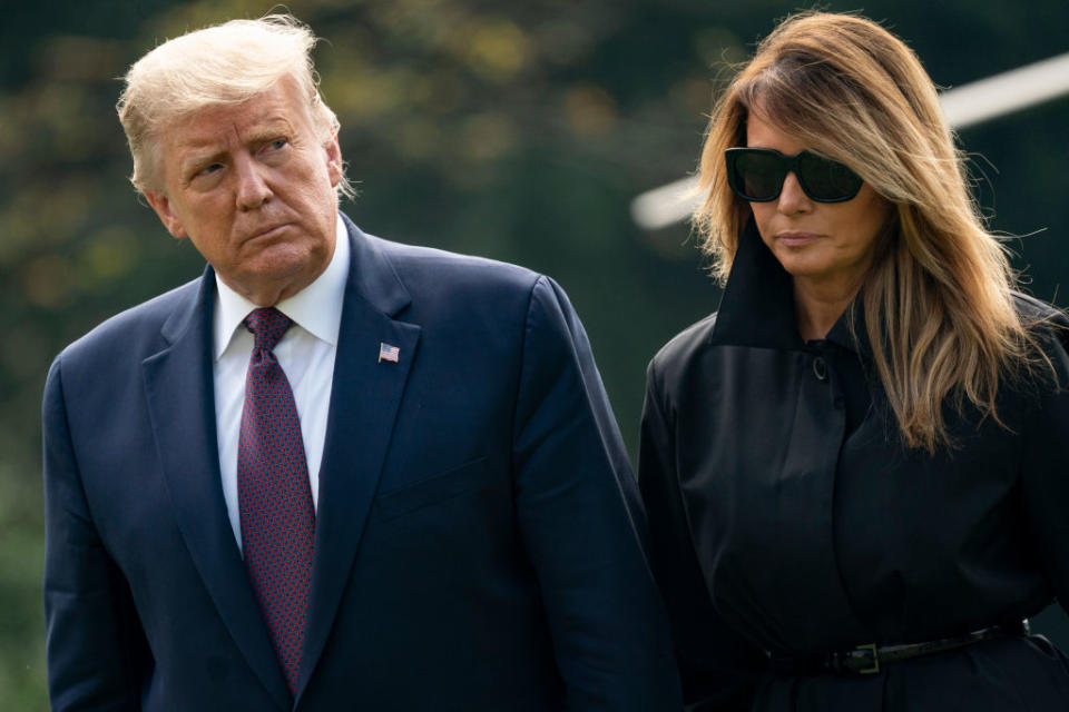Donald Trump and first lady Melania Trump walk to the White House residence. Source: Getty