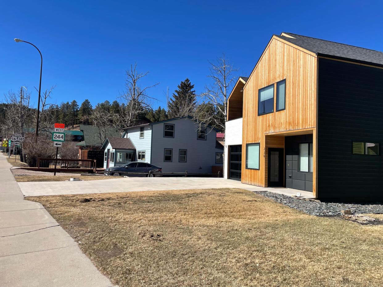 These two short-term rental homes in downtown Hill City appear well-kept, but are seen by some local officials as preventing potential full-time residents from occupying homes within the city limits.