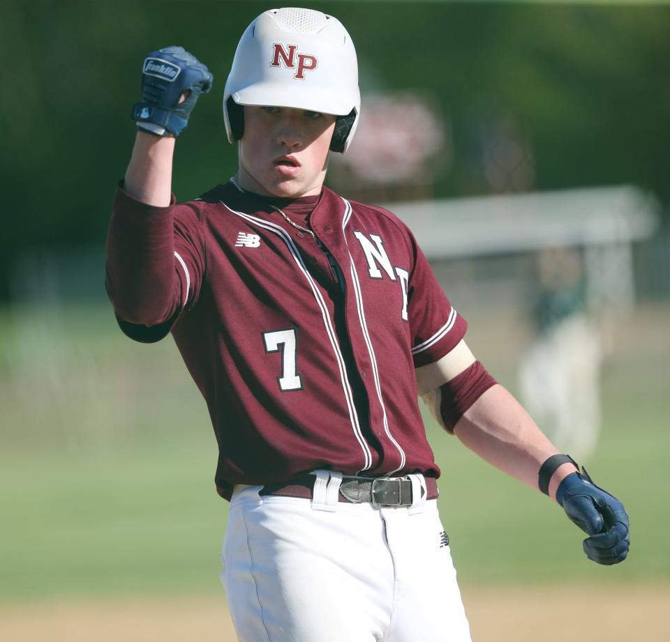 New Paltz's Jack Maiale pumps his fist after hitting an RBI double against Spackenkill during a May 7, 2024 baseball game.