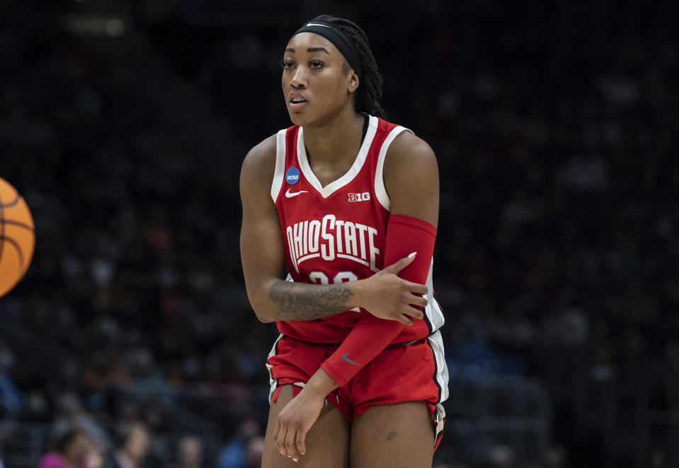 Ohio State forward Cotie McMahon holds her elbow during the second half of a Sweet 16 college basketball game of the NCAA Tournament against UConn, Saturday, March 25, 2023, in Seattle. Ohio State won 73-61. (AP Photo/Stephen Brashear)