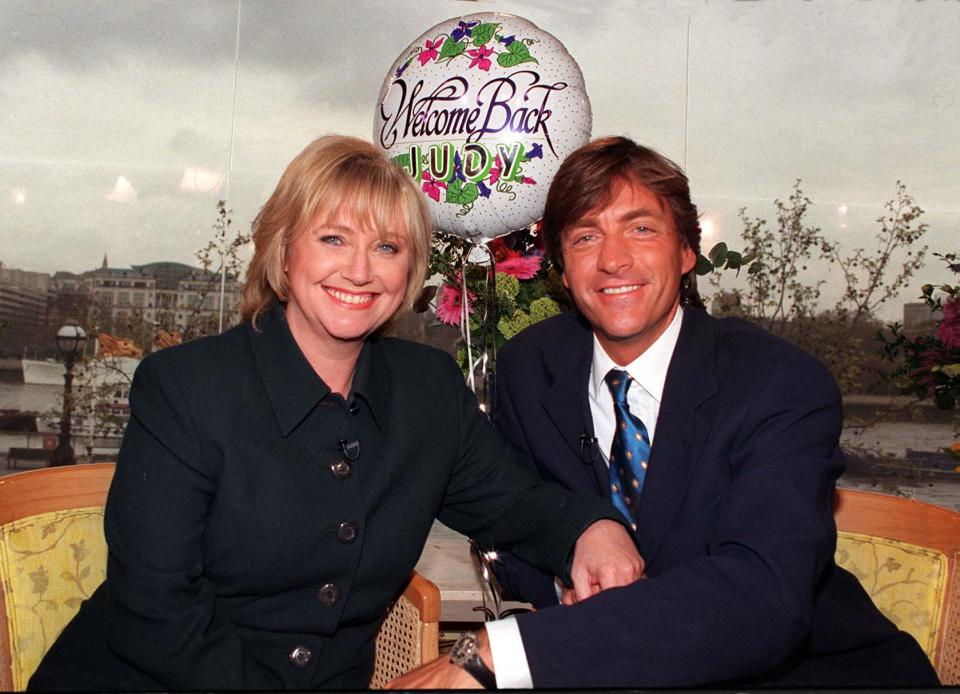 TV presenter Judy Finnigan poses for the media with her husband Richard Madeley during a photocall today (Monday) after returning to This Morning following her recent operation. She has been off the programme since mid-January to recuperate from a hysterectomy. Photo by Michael Stephens/PA. See PA story SHOWBIZ Finnigan
