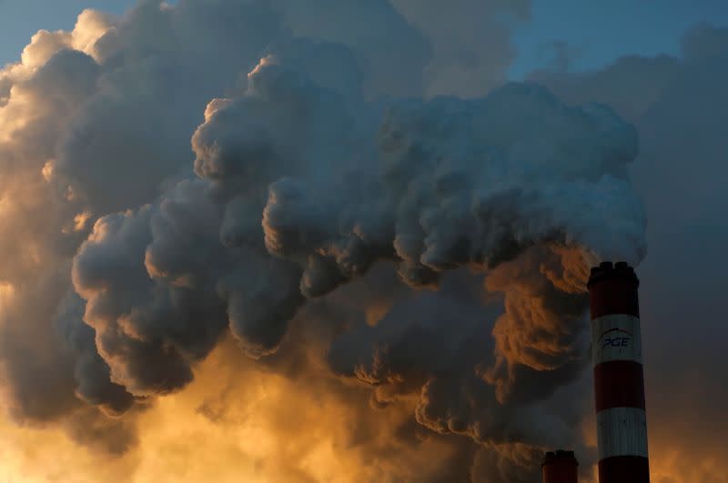 FILE PHOTO: Smoke and steam billows from Belchatow Power Station, Europe's largest coal-fired power plant operated by PGE Group, near Belchatow