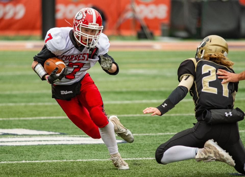 Forreston's Evan Kelsey evades Camp Point Central's Clayton Boehler for a gain during the second quarter of the 1A State Championship game in Champaign on Friday, Nov. 23, 2018. Forreston won the game 44-6. [RANDY STUKENBERG/RRSTAR.COM & THE JOURNAL-STANDARD CORRESPONDENT]