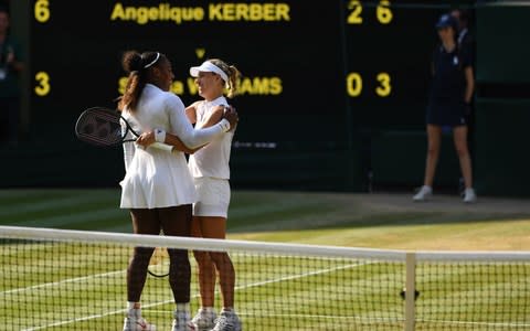 The women embraced on Centre Court following the final - Credit: Glyn Kirk/AFP