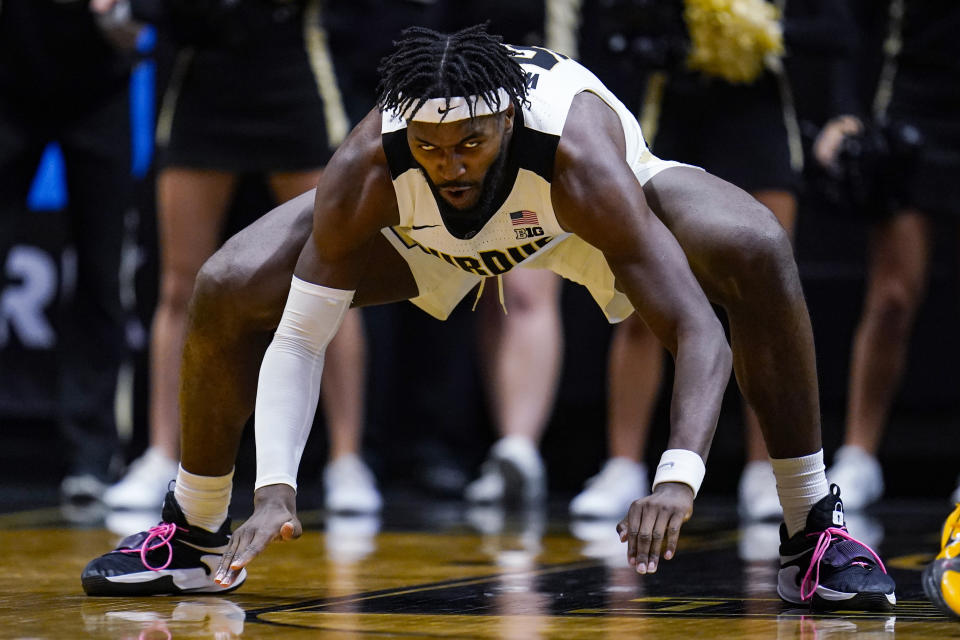 Purdue forward Trevion Williams celebrates after a basket against Iowa during the second half of an NCAA college basketball game in West Lafayette, Ind., Friday, Dec. 3, 2021. Purdue won 77-70. (AP Photo/Michael Conroy)