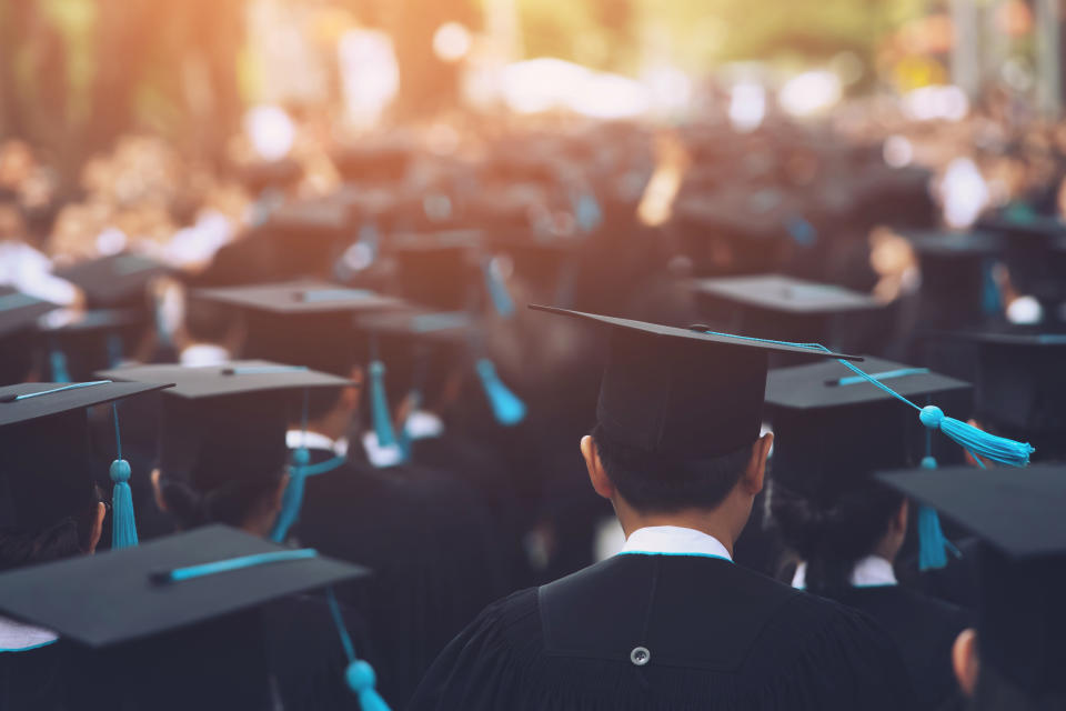 University Students Wearing Mortarboard During Event