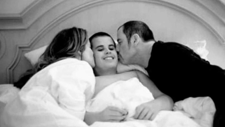 <p>John Travolta and wife, Kelly Preston, posted a touching photo of their late son, Jett, who died over 10-years ago. Preston shared the photo of Travolta and herself kissing a smiling Jett Travolta as a reminder for autism awareness, which is recognized throughout the month of April. “To my sweet love, Jett… you are in […]</p> <p>The post <a rel="nofollow noopener" href="https://theblast.com/kelly-preston-john-travolta-jett-autism-awareness/" target="_blank" data-ylk="slk:Kelly Preston Shares Sweet Photo of John Travolta & Late Son Jett for Autism Awareness;elm:context_link;itc:0;sec:content-canvas" class="link ">Kelly Preston Shares Sweet Photo of John Travolta & Late Son Jett for Autism Awareness</a> appeared first on <a rel="nofollow noopener" href="https://theblast.com" target="_blank" data-ylk="slk:The Blast;elm:context_link;itc:0;sec:content-canvas" class="link ">The Blast</a>.</p>
