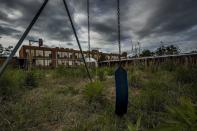 <p>A swing sits unhinged in front of an empty school building.</p><p>Photo: Flickr/<a href="https://www.flickr.com/photos/141333312@N03/40500182250/in/photostream/" rel="nofollow noopener" target="_blank" data-ylk="slk:Trevor Marrons;elm:context_link;itc:0;sec:content-canvas" class="link ">Trevor Marrons</a></p>