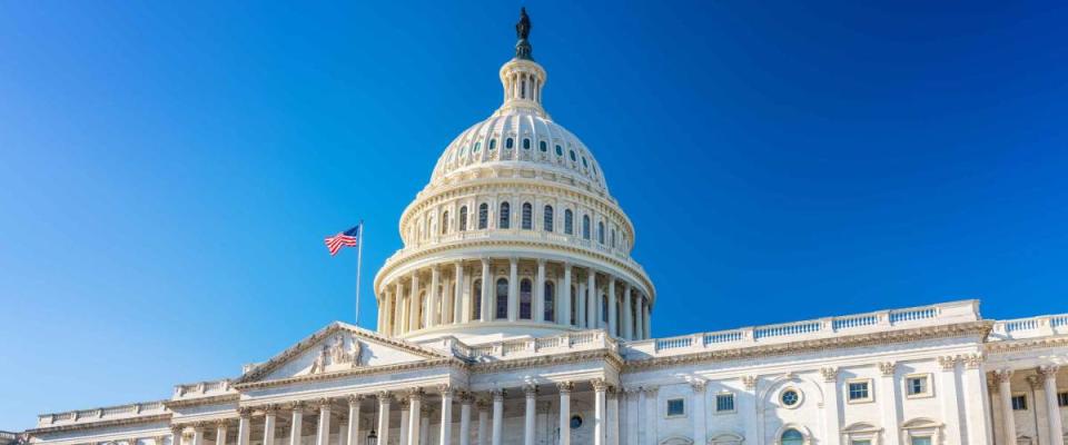 US Capitol over blue sky