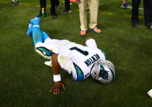 Sep 8, 2016; Denver, CO, USA; Carolina Panthers quarterback Cam Newton (1) reacts in pain on the sidelines after suffering an injury in the third quarter against the Denver Broncos at Sports Authority Field at Mile High. Mandatory Credit: Mark J. Rebilas-USA TODAY Sports