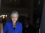 Britain's Prime Minister Theresa May arrives to speak outside 10 Downing Street, London before leaving for Buckingham Palace where she will hand her resignation to Queen Elizabeth II, Wednesday, July 24, 2019. Boris Johnson will replace May as Prime Minister later Wednesday, following her resignation last month after Parliament repeatedly rejected the Brexit withdrawal agreement she struck with the European Union. (AP Photo/Frank Augstein)