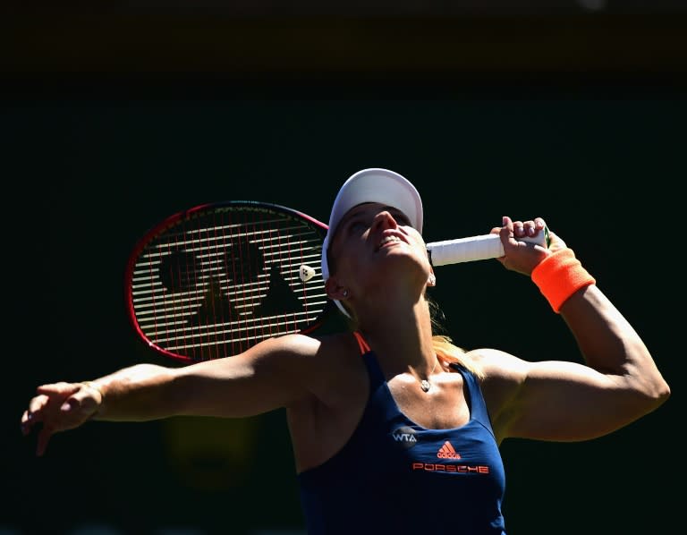 Angelique Kerber serves during her straight set win over Andrea Petkovic of Germany at Indian Wells Tennis Garden