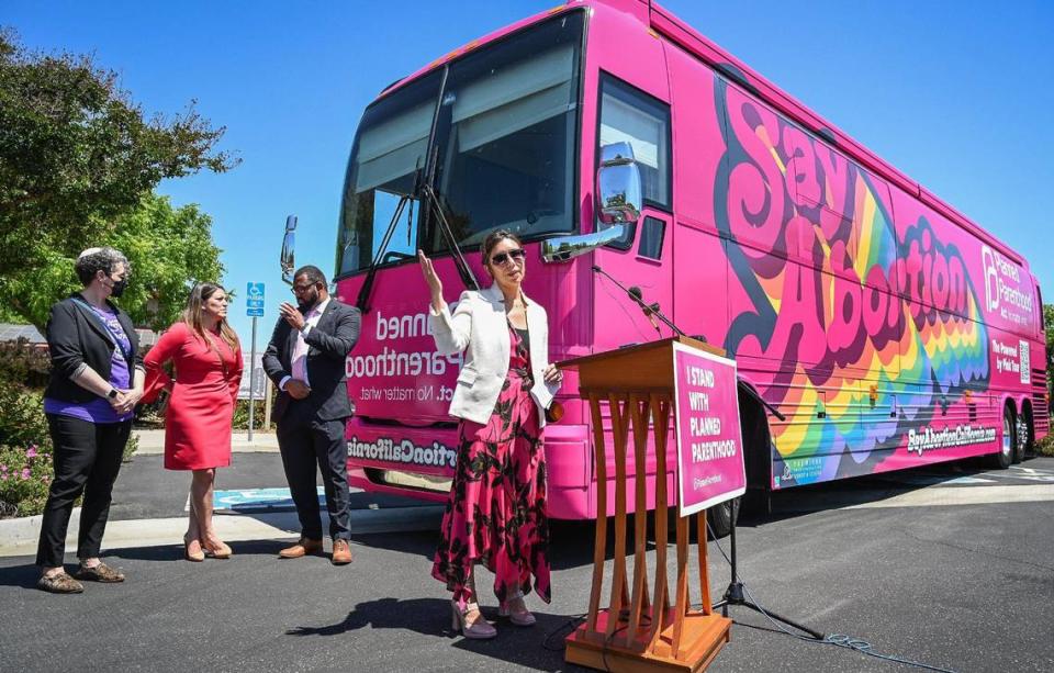 Jodi Hicks, CEO/President of Planned Parenthood Affiliates of California, answers questions from the media during the Planned Parenthood Affiliates of California “Powered by Pink” Bus Tour stop at the Unitarian Universalist Church of Fresno on May 17, 2022.