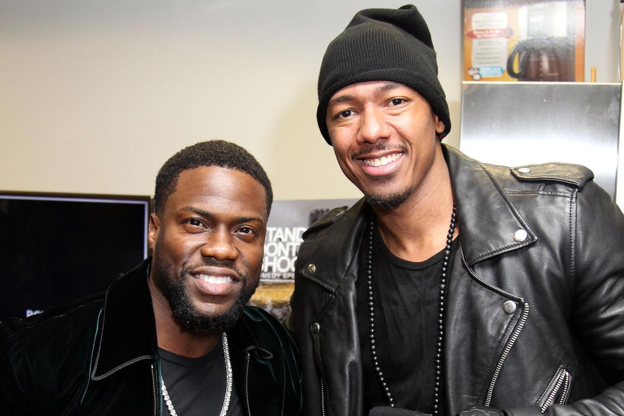 Actors Kevin Hart and Nick Cannon backstage at The Ebony Repertory Theatre on December 9, 2016 in Los Angeles, California.