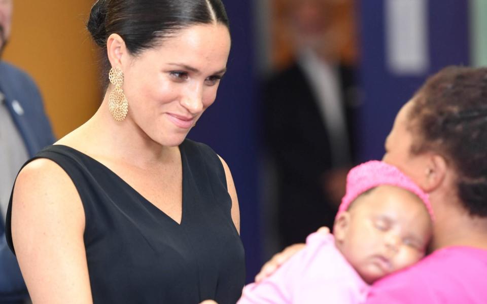 The Duchess during a visit to the mothers2mothers (m2m) charity organisation that trains and employs women living with HIV as frontline health workers across eight African nations and advocates for an HIV-free Africa, in Cape Town, South Africa September 25, 2019 - Paul Edwards/Pool via REUTERS