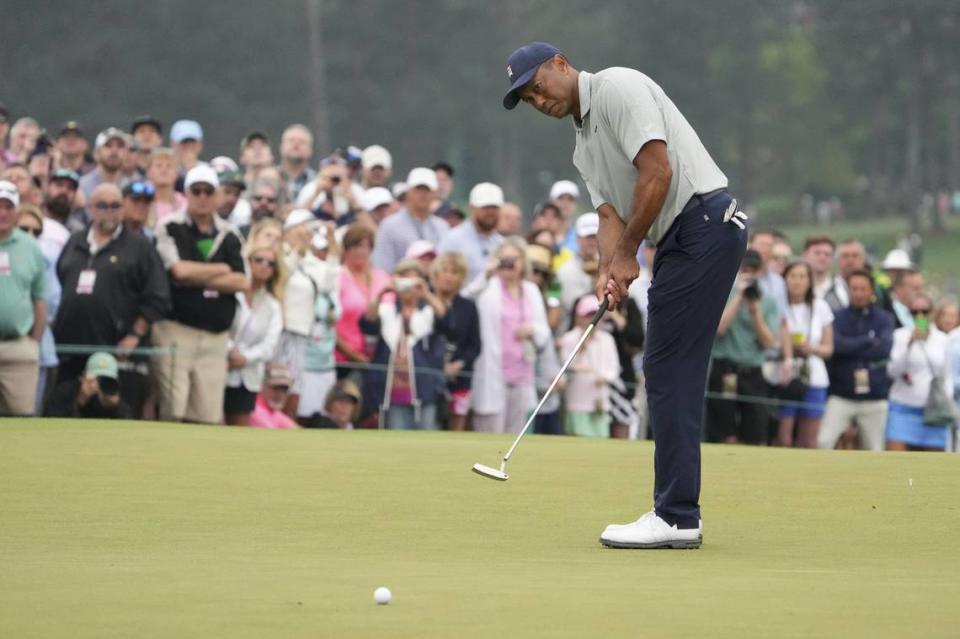 Apr 4, 2023; Augusta, Georgia, USA; Tiger Woods putts on the ninth green during a practice round for The Masters golf tournament at Augusta National Golf Club. Mandatory Credit: Danielle Parhizkaran-USA TODAY Network