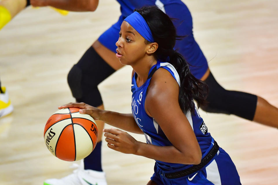 Lexie Brown dribbles the ball during a Lynx game in 2020.