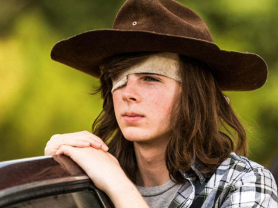 Chandler Riggs as Carl Grimes in ‘The Walking Dead’ (AMC Studios)