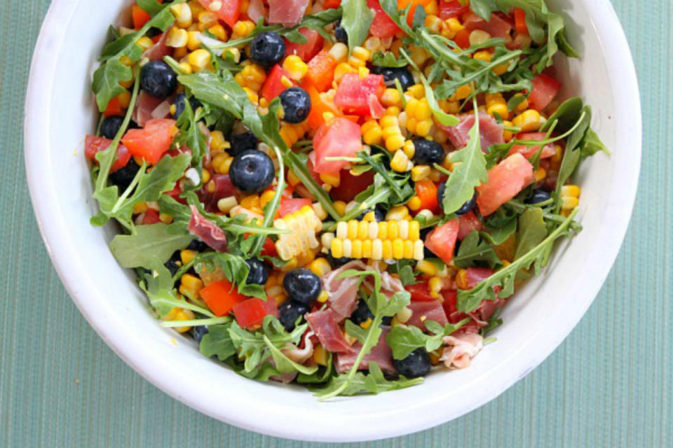 <p>Recipe Girl</p><p>Dotted with corn, blueberries, tomato and arugula, this salad basically screams summer. </p><p><strong>Recipe here:</strong> <strong><a href="http://www.recipegirl.com/2014/07/14/blueberry-corn-salad-with-prosciutto/" rel="nofollow noopener" target="_blank" data-ylk="slk:Blueberry Corn Salad with Prosciutto;elm:context_link;itc:0;sec:content-canvas" class="link ">Blueberry Corn Salad with Prosciutto</a></strong></p>