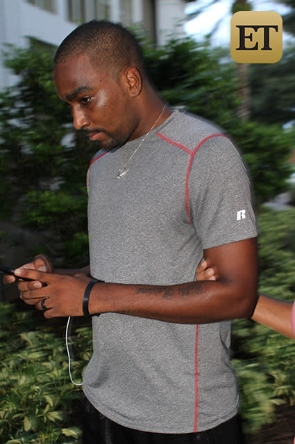 Nick Gordon is leaning on his mother for support following the news that his girlfriend, Bobbi Kristina Brown, died Sunday at a hospice in Georgia. On Monday, Nick was spotted in Florida with his mother, Michelle Gordon, taking a short walk around their gated community. The two held on to each other, Nick clad in basketball shorts and a T-shirt. The embattled 25-year-old was still wearing a ring on his left finger, symbolizing his relationship with the late Bobbi Kristina, and was also wearing the ring he gave to Bobbi Kristina on his neck. The two claimed to have tied the knot on Jan. 9, 2014, though family representatives later said the marriage was not official. AKM/GSI AKM/GSI <strong>WATCH: Bobbi Kristina Brown Dead at 22</strong> AKM/GSI ET talked to Nick's younger brother, Junior Walker, on Monday, who said he was actually the one who broke the news about Bobbi Kristina's death to Nick. He said Nick found out about the news at the same time the public did. "He didn't even know," Junior said. "I told him ET posted it ... and then his lawyer called on the phone while I was talking to him. He was on the phone with me and I told him that ET [was] posting saying Kris is gone." Junior said that Nick is doing "bad" after learning of the tragic news, but contrary to reports, he is not on suicide watch. "We're all hurt right now trying to figure out how to cope through everything," Junior said. "This whole year has not been easy at all." Michelle Gordon also commented on her son's state of mind with a statement on Monday, saying he's "suffered greatly." "The passing of Bobbi Kristina is devastating to Nick and our family," she said. "Nick loved and cared for Krissi deeply, and he has suffered greatly each and every day they've been apart. Nick and our family are in mourning, and we ask that you respect our privacy. Our thoughts and prayers are with both the Houstons and the Browns during this difficult time." In May, Nick asked to see Bobbi Kristina when she was hospitalized at an Atlanta rehabilitation center, claiming through his attorneys that he had stayed away from months because he respected both the Houston and Brown families' wishes that he refrain from visiting. But in February, Bobby Brown's lawyer said that Nick had already previously been offered an opportunity to potentially visit Bobbi Kristina, though he "declined to meet the terms of any possible visit." Bobbi Kristina died Sunday, surrounded by close family and friends. She was 22 years old. <strong>WATCH: Houston Family Reveals Details From Bobbi Kristina Brown's Final Moments, Funeral Plans</strong> Meanwhile, Nick is currently facing a $10 million civil lawsuit filed by Bobbi Kristina's conservator, Bedelia Hargrove, claiming that he physically abused Bobbi Kristina, and stole thousands from her. However, no criminal charges have been filed against him. Last month, ET learned that Nick has assembled his own high-powered legal team to defend himself, which includes famed attorney Jose Baez, who's best known for defending Casey Anthony against first-degree murder charges in 2011. Watch below: