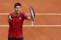 Tennis - French Open - Roland Garros - Novak Djokovic of Serbia vs Yen-Hsun Lu of Taiwan - Paris, France - 24/05/16. Novak Djokovic celebrates. REUTERS/Benoit Tessier