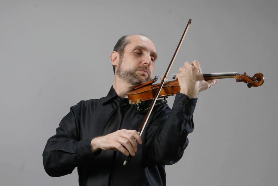 Violinist Leonid Yanovskiy, director of strings and orchestra at the UWF Dr. Grier Williams School of Music, will be one of the performers May 21 at Temple Beth El.