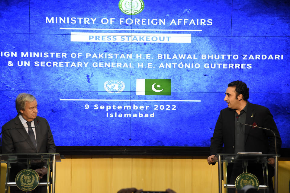 Pakistani Foreign Minister Bilawal Bhutto Zardari, right, speaks during a joint press conference with U.N. Secretary-General Antonio Guterres at the Foreign Ministry in Islamabad, Pakistan, Friday, Sept. 9, 2022. Guterres appealed to the world for help for cash-strapped Pakistan after arriving in the country Friday to see the climate-induced devastation from months of deadly record floods. (AP Photo/W.K. Yousafzai)