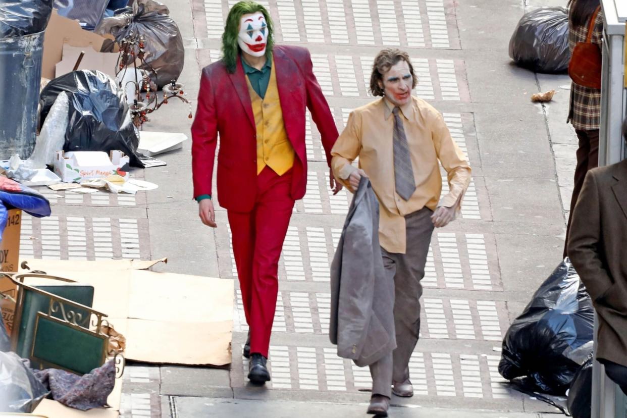 Los Angeles, CA - *PREMIUM-EXCLUSIVE* - Actor Joaquin Phoenix can be seen in full costume while filming scenes on the streets of Downtown Los Angeles for the highly anticipated movie 'Joker: Folie à Deux.' Pictured: Joaquin Phoenix BACKGRID USA 4 MARCH 2023 USA: +1 310 798 9111 / usasales@backgrid.com UK: +44 208 344 2007 / uksales@backgrid.com *UK Clients - Pictures Containing Children Please Pixelate Face Prior To Publication*