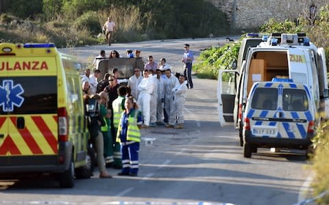 Ambulance parked on the road where a car bomb killed Daphne Caruana Galizia - Credit: Rene Rossignaud/AP