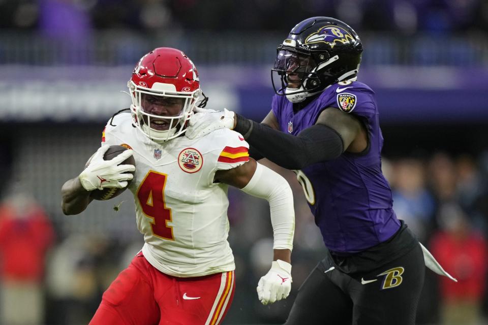Kansas City Chiefs wide receiver Rashee Rice (4) is tackled by Baltimore Ravens linebacker Patrick Queen (6) during the first half of the AFC Championship NFL football game, Sunday, Jan. 28, 2024, in Baltimore. (AP Photo/Matt Slocum)