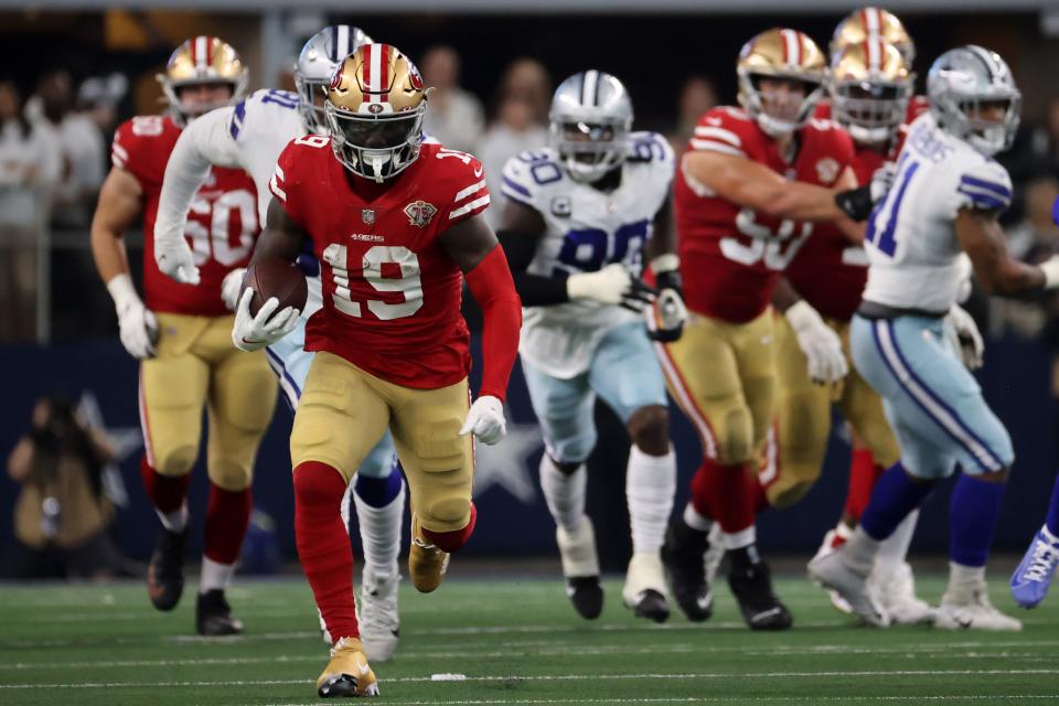 49ers wide receiver Deebo Samuel runs with the ball against the Cowboys during last season's wild-card playoff game.