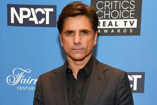 <p>Michael Kovac/Getty</p> John Stamos