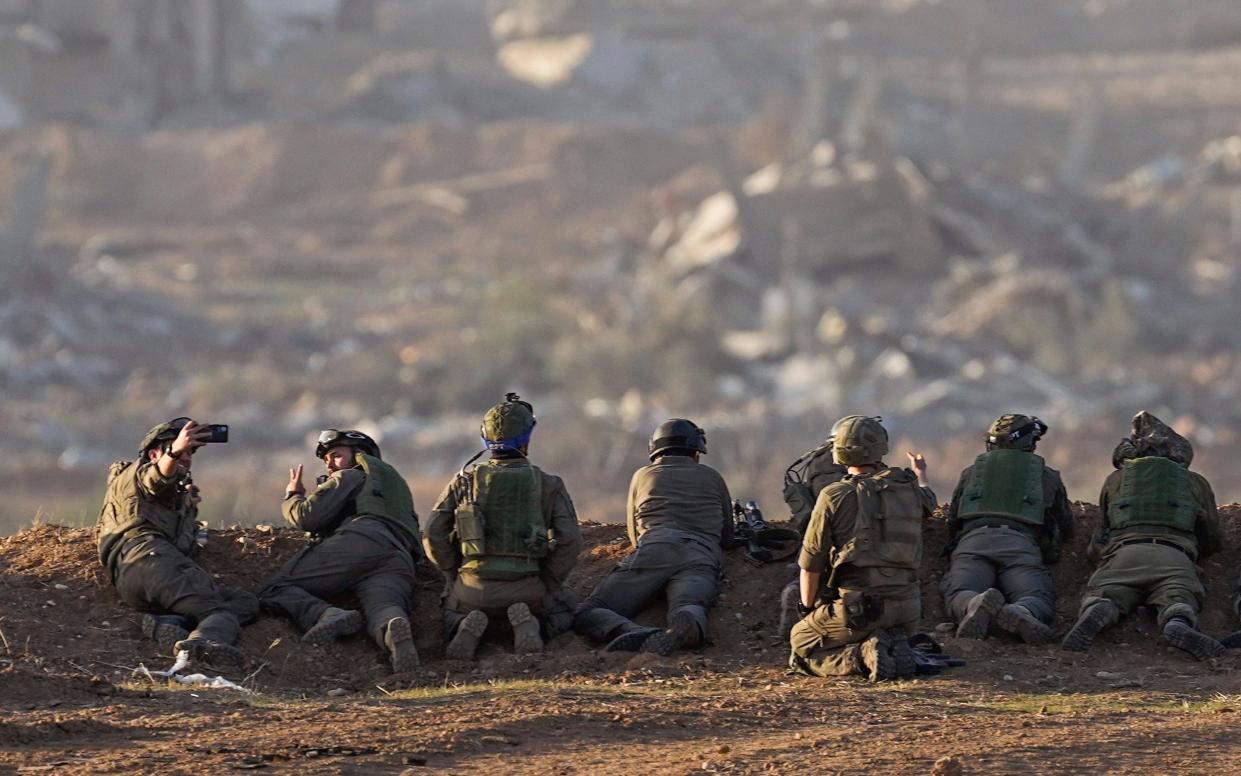 Israeli soldiers in position near the Gaza Strip