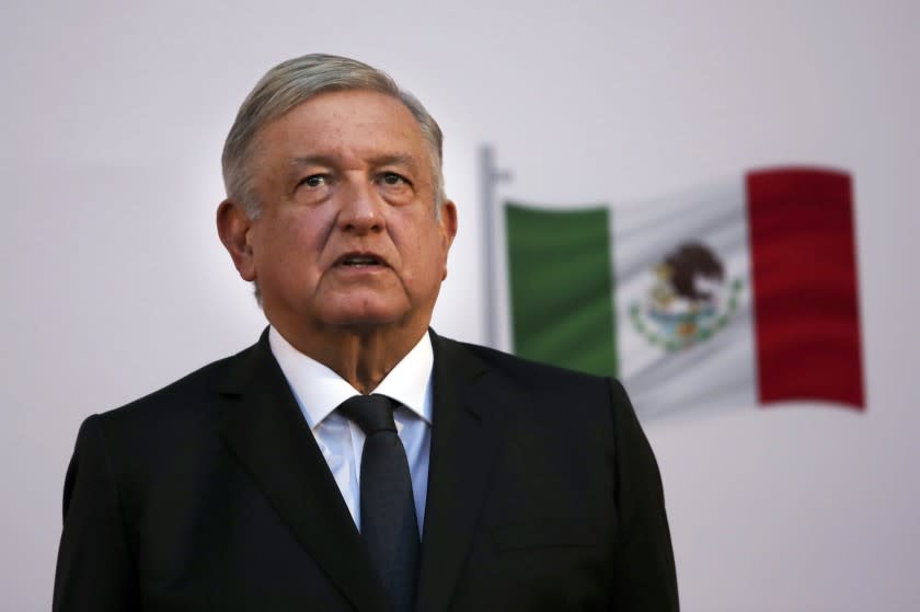 FILE - In this Dec. 1, 2020 file photo, Mexican President Andrés Manuel López Obrador attends the commemoration of his second anniversary in office at the National Palace in Mexico City. One day after Mexico's Attorney General's Office announced it was dropping the drug trafficking case against its former defense secretary, López Obrador said Friday, Jan. 15, 2020 that the U.S. Drug Enforcement Administration had "fabricated" the accusations against retired Gen. Salvador Cienfuegos. (AP Photo/Marco Ugarte, File)