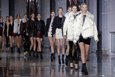 Models present creations by designer Anthony Vaccarello during his Fall/Winter 2016/2017 women's ready-to-wear collection show in Paris, France, March 1, 2016. REUTERS/Benoit Tessier