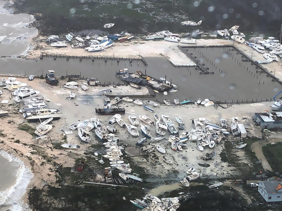 U.S. Coast Guard Station Clearwater, boats litter the area around marina in the Bahamas after they were tossed around by Hurricane Dorian on Sept. 2, 2019. (U.S. Coast Guard Station Clearwater via AP)