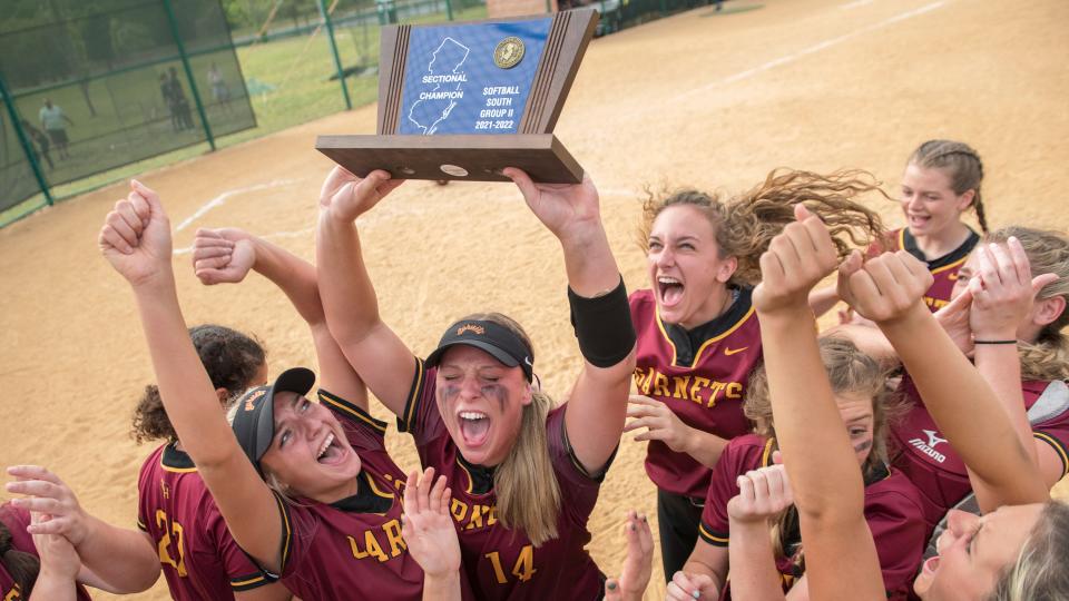 Members of the Haddon Heights High School softball team celebrate after defeating Cedar Creek, 8-0, in the South Jersey Group 2 championship game played at Cedar Creek High School on Thursday, May 26, 2022 .