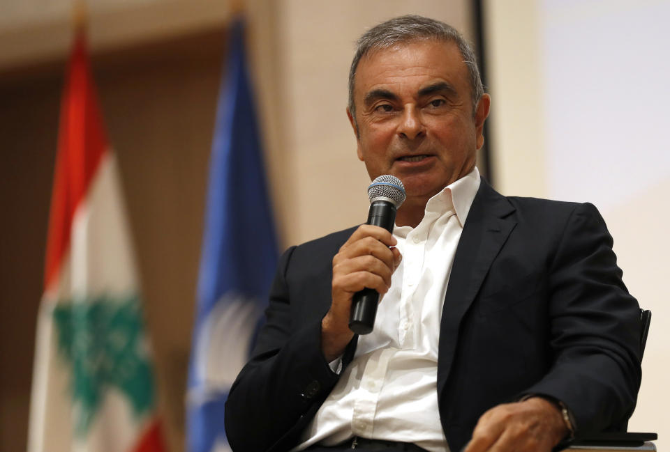 Former Nissan Motor Co. Chairman Carlos Ghosn holds a press conference at the Maronite Christian Holy Spirit University of Kaslik, as he launches an initiative to help Lebanon that is undergoing a severe economic and financial crisis, in Kaslik, north of Beirut, Lebanon, Tuesday, Sept. 29, 2020. Ghosn was arrested in Japan in 2018, and was awaiting trial on charges of under-reporting future income and breach of trust when he jumped bail and escaped to Lebanon late last year. (AP Photo/Hussein Malla)