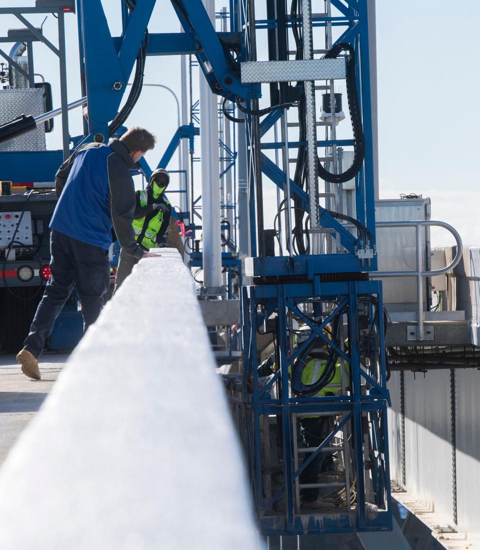 Escambia County Commissioner Robert Bender gets a closer look as workers put the finishing touches on the new westbound span of the Gen. Daniel "Chappie" James, Jr. Bridge on Friday, Feb. 3, 2023. Florida transportation officials are expecting to open the westbound span to traffic on or around Feb. 13, 2023.